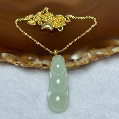 18K Gold Type A Semi Icy Green Jadeite Peapod Pendant in S925 Sliver in Gold Colour Necklace 3.55g 34.7 by 12.3 by 5.5mm - Huangs Jadeite and Jewelry Pte Ltd