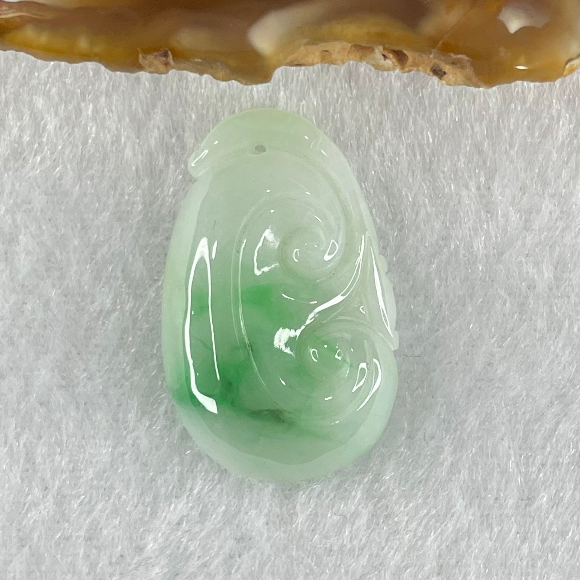 Type A Faint Lavender with Spicy Green Patches Jadeite Ruyi Pendant 4.63g 26.4 by 16.8 by 6.2mm - Huangs Jadeite and Jewelry Pte Ltd