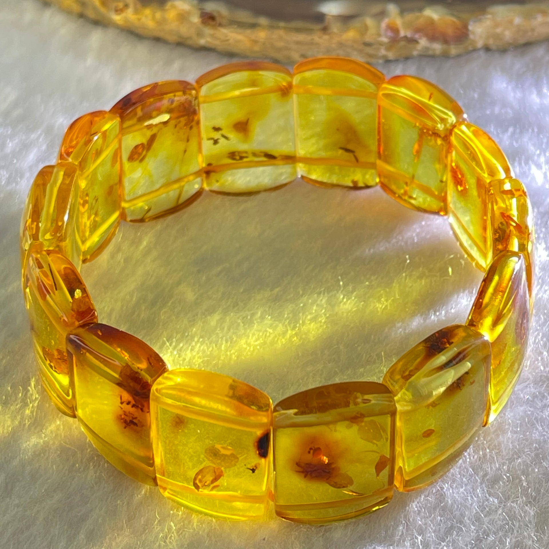 Natural Yellow Flower Amber Shou Pai Bracelet 天然花珀手牌手链 15.96g 16cm 19.8 by 14.4 by 5.1mm 14pcs - Huangs Jadeite and Jewelry Pte Ltd