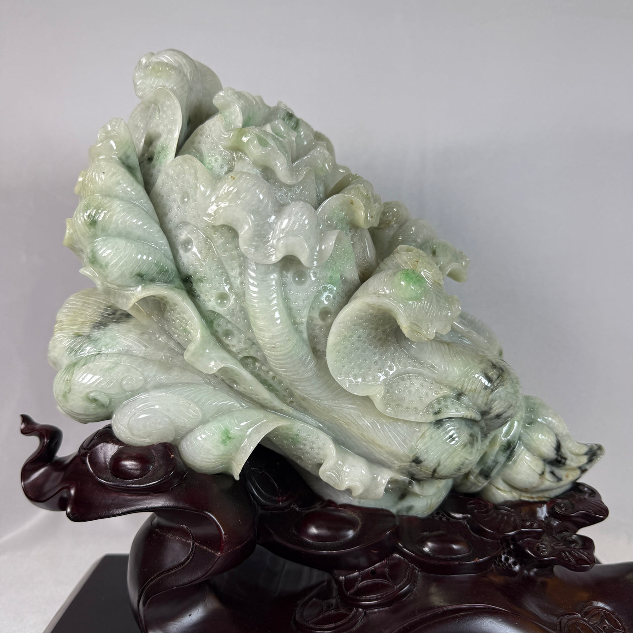 Natural Type A Jadeite Light Green Faint Lavender with Blueish Green Piao Hua Cabbage with Wooden Stand Display 4,724.3g 325.0 by 170.0 by 320.0mm - Huangs Jadeite and Jewelry Pte Ltd
