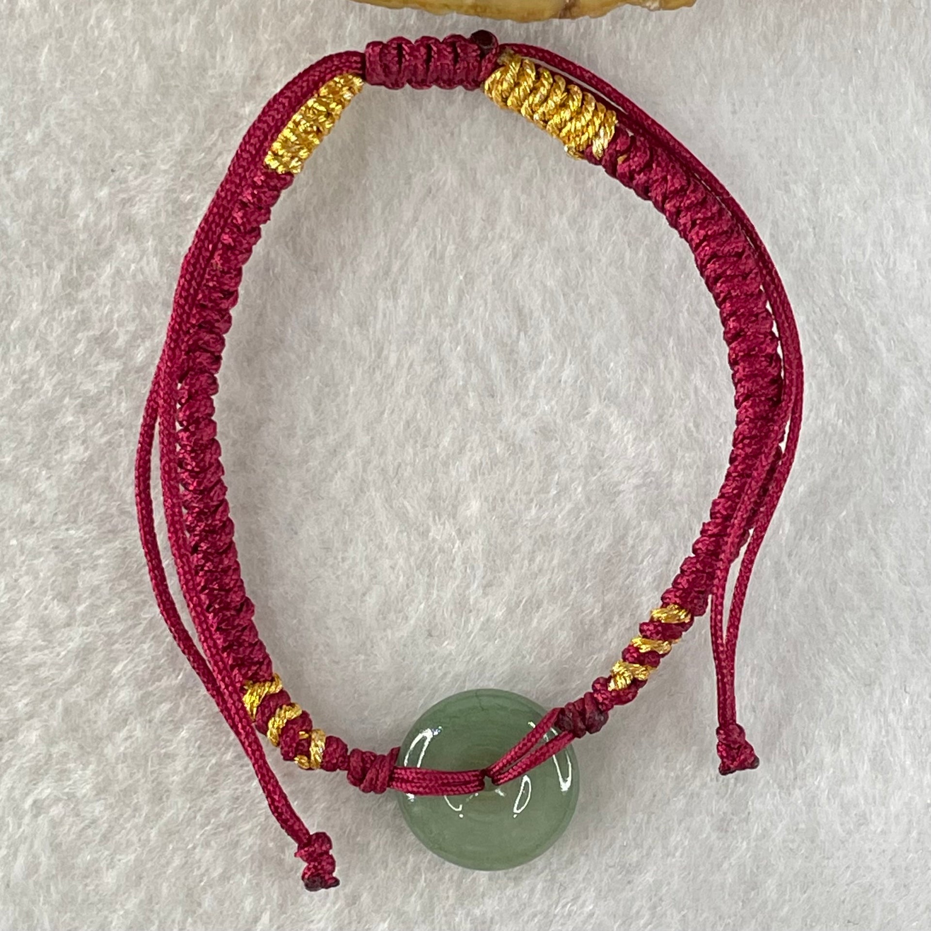 Type A Blueish Green Jadeite Ping An Kou Donut In String Bracelet 1.90g 12.5 by 3.8mm - Huangs Jadeite and Jewelry Pte Ltd