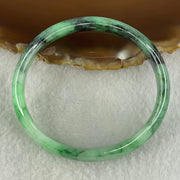 Type A Natural Old Mine Spicy Green with Dark Green Piao Hua Flora Jadeite Oval Bangle 26.28g 131.60cts Inner Diameter 52.55mm 46.90 by 5.40mm with NGI Cert 63804952 (Very Very Slight Internal Lines) - Huangs Jadeite and Jewelry Pte Ltd