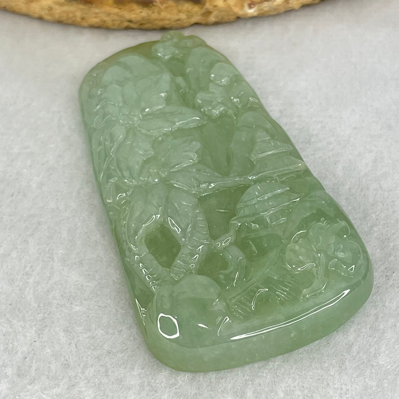 Type A Semi Icy Light Green Jadeite Shan Shui Gui Ren Benefactor and Flower Pendant 34.95g 58.8 by 33.9 by 8.8mm - Huangs Jadeite and Jewelry Pte Ltd