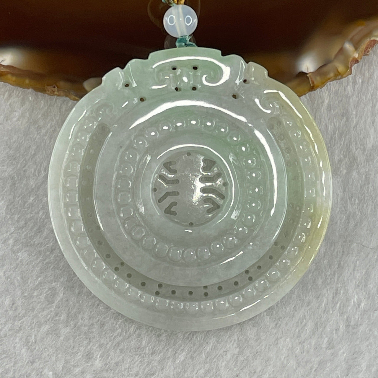 Natural Type A Light Green with Yellow Jadeite Round Pendant 33.87g 53.7 by 5.4mm