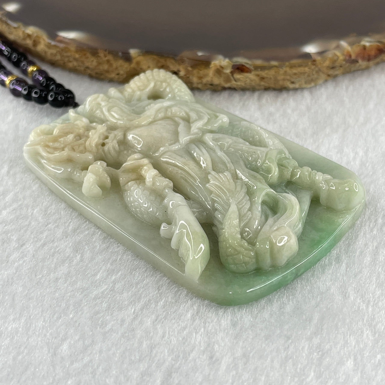 Natural Type A Light Green with Yellow and Faint Lavender Jadeite Guan Gong with Dragon Pendant 66.53g 70.0 by 46.9 by 10.0mm