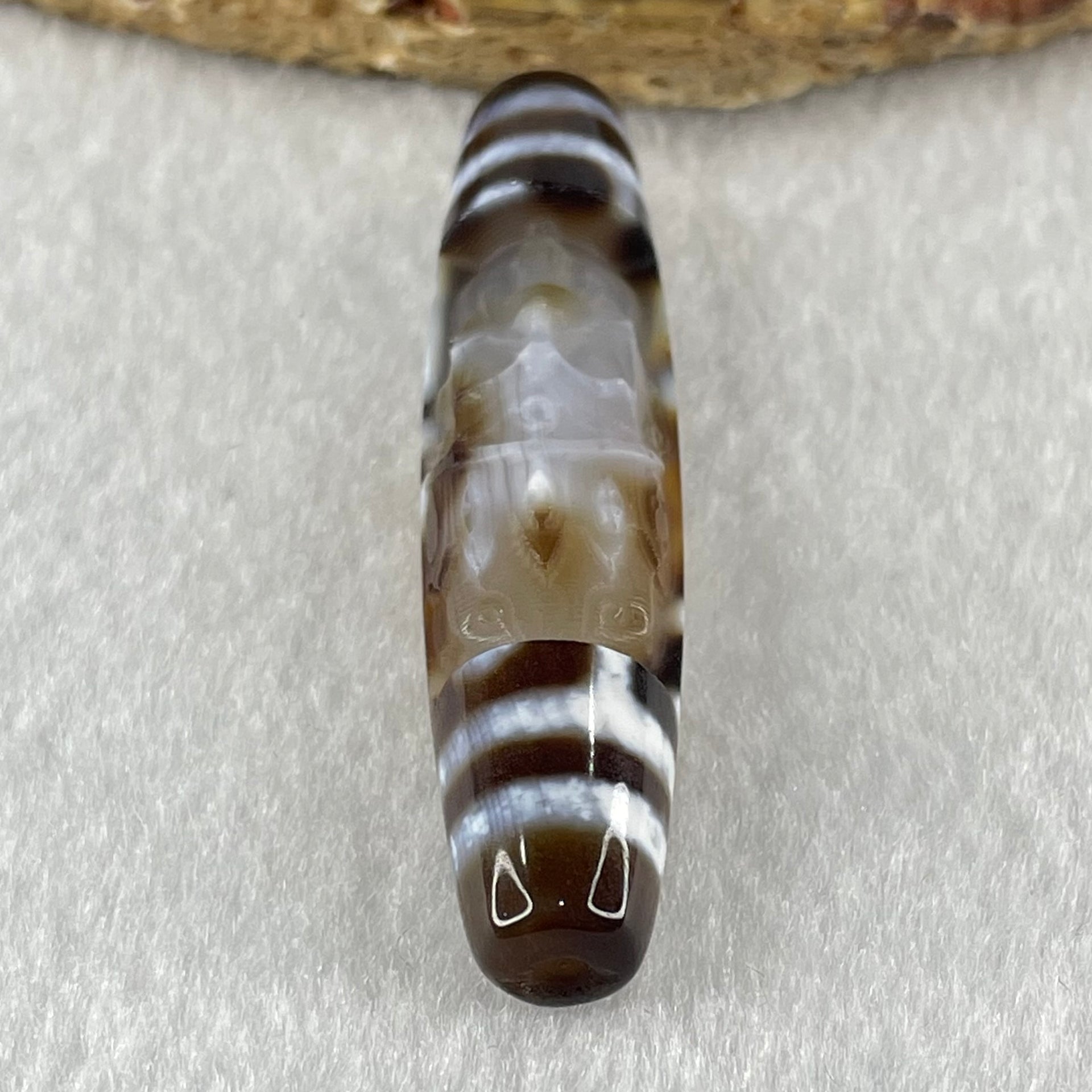 Natural Powerful Tibetan Old Oily Agate Zha Ji La Mu Female Cai Shen Carvings on 9 Eyes Dzi Bead Heavenly Master (Tian Zhu) 九眼扎基拉姆女财神天珠 14.46g 58.4 by 13.0mm - Huangs Jadeite and Jewelry Pte Ltd