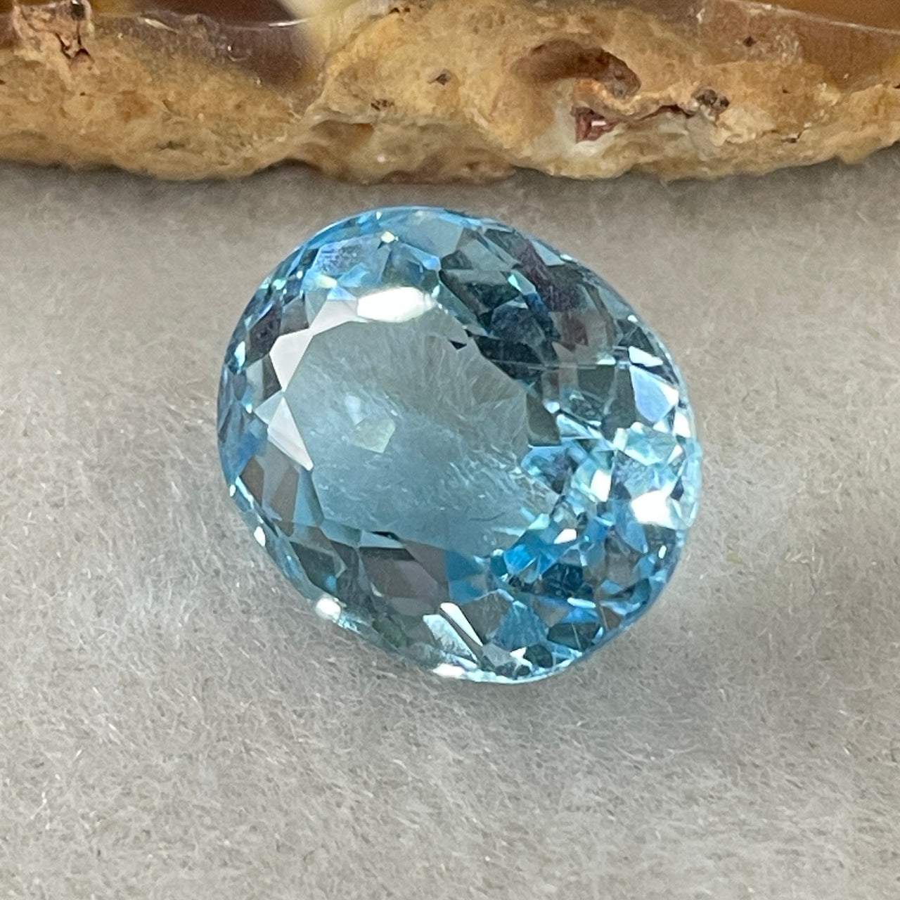 Natural Sky Blue Topaz Oval Shape 12.31ct 14.7 by 11.8 by 8.1mm - Huangs Jadeite and Jewelry Pte Ltd