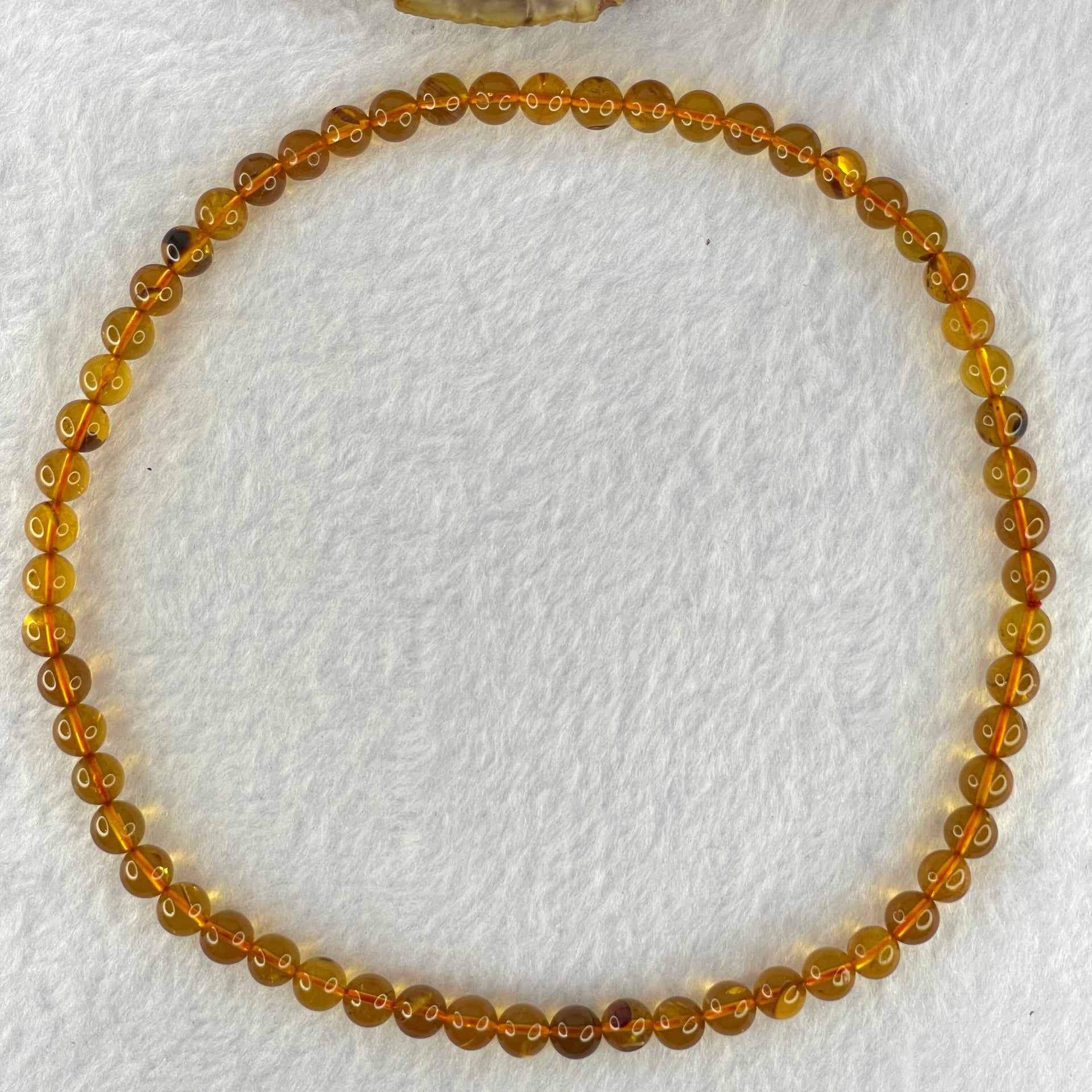 Natural Gold Yellow Amber Elastic Necklace 天然黄琥珀项链 9.24g 32cm 6.7mm 59 Beads - Huangs Jadeite and Jewelry Pte Ltd
