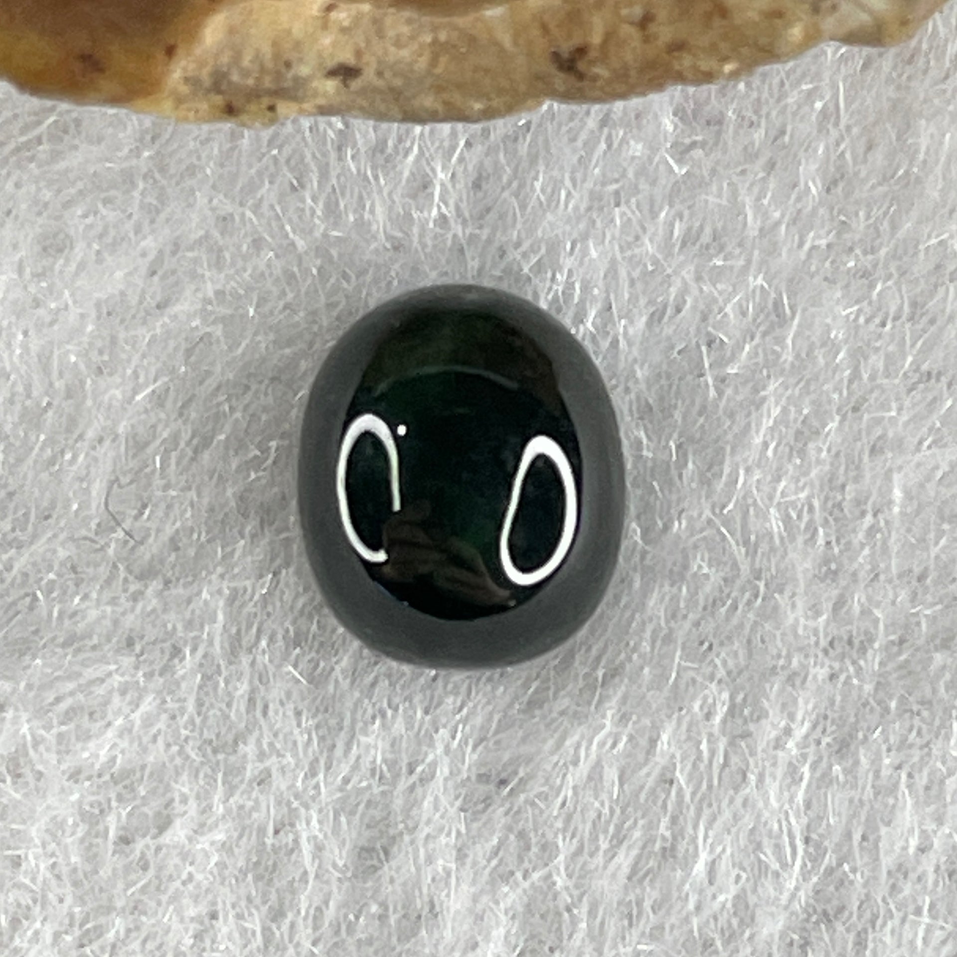Type A Translucent Black Omphacite Jadeite Oval Cabouchon Stone For Setting 0.38g 7.3 by 6.1 by 4.0mm - Huangs Jadeite and Jewelry Pte Ltd
