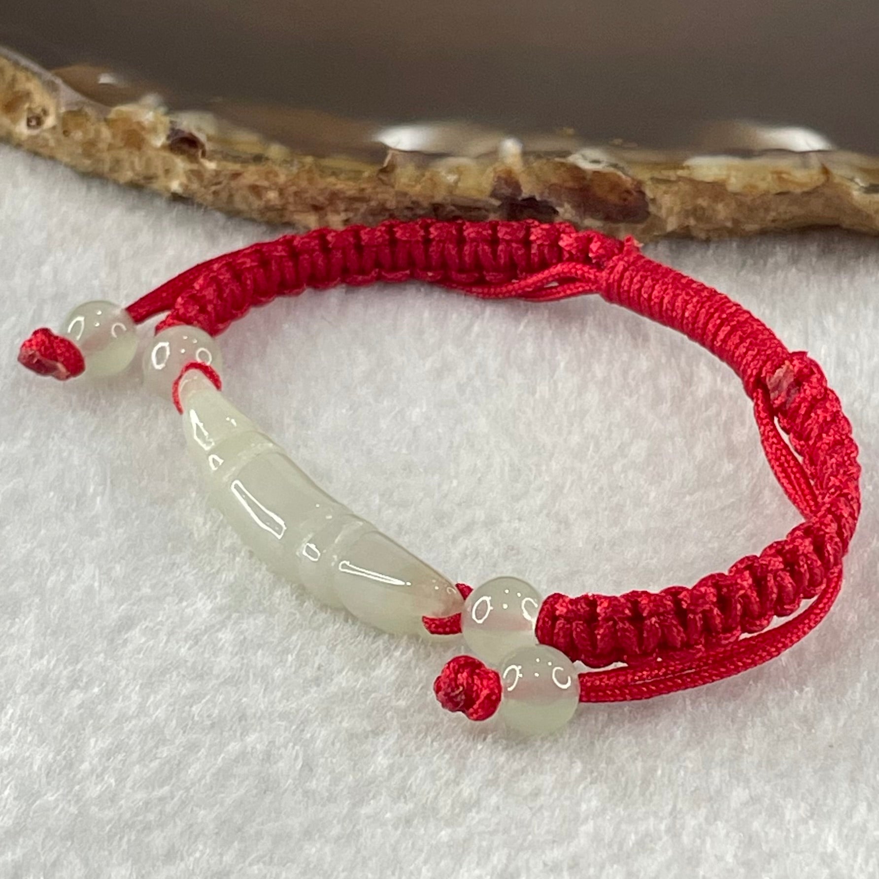 Type A Light Green Jadeite Scholarship Brush in Red String Bracelet 5.57g 6.7 by 7.5 by 33.5mm - Huangs Jadeite and Jewelry Pte Ltd