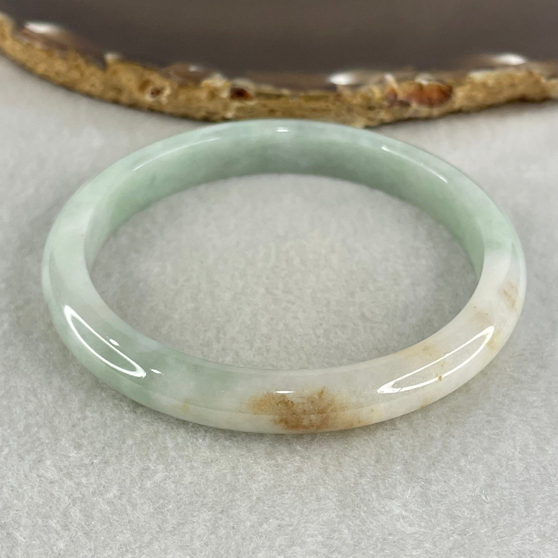 Type A Light Green with Brown Patches Jadeite Bangle 34.69g Inner Diameter 59.7mm 9.3 by 6.9mm (Very Slight Internal Lines) - Huangs Jadeite and Jewelry Pte Ltd
