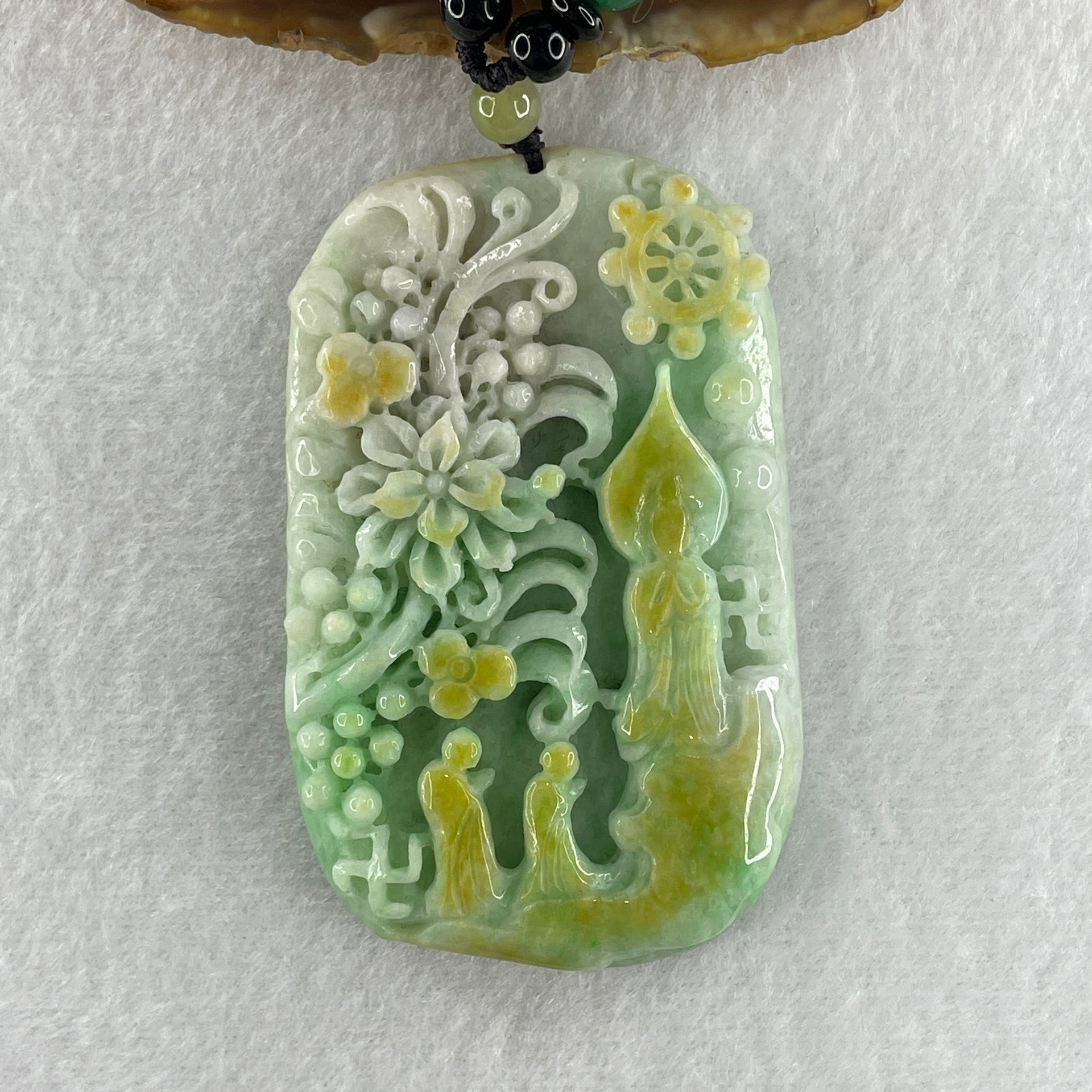 Natural Type A Blueish Green with Yellow Jadeite Buddha and Flowers with People Seeking for Enlightenment Pendant 87.75g 72.8 by 45.7 by 11.8mm - Huangs Jadeite and Jewelry Pte Ltd