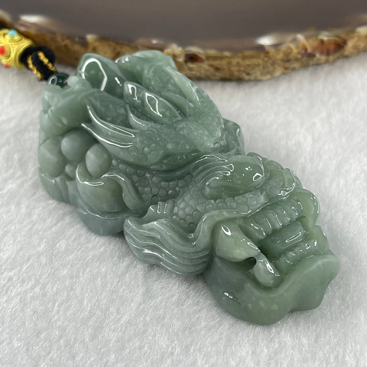 Natural Type A Blueish Green Jadeite Dragon Head Pendant 111.01g 78.0 by 40.7 by 22.2mm