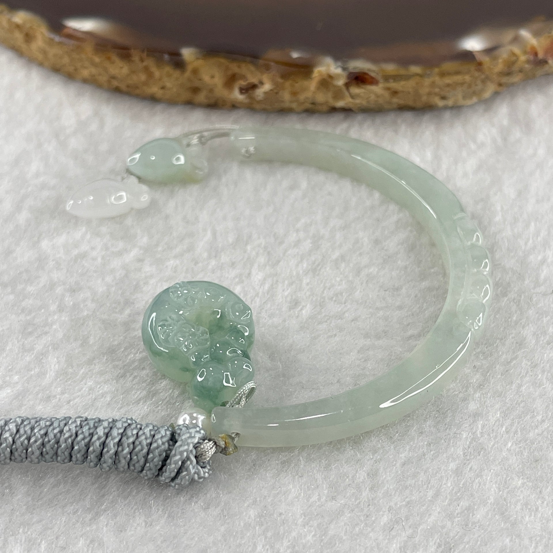 Natural Type A Semi Icy Light Green Jadeite Moon with Rabbit and Flower on Ping An Kou and Carrot Necklace 11.72g 17.2 by 13.6 by 8.6mm Ping An Kou - 56.7 by 4.4 by 5.5mm Moon - Huangs Jadeite and Jewelry Pte Ltd