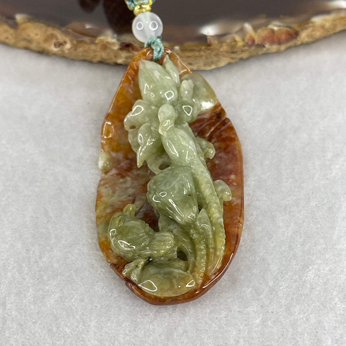 Natural Type A Yellowish Green & Brownish Red Jadeite Lotus Flower with Bird Pendant | (21.38g | 56.0x29.2x13.5mm | Heart, Root & Solar Plexus Chakra Harmony, "Lian Hua Xian Niao" Noble Prosperity & Sacred Purity Shield)