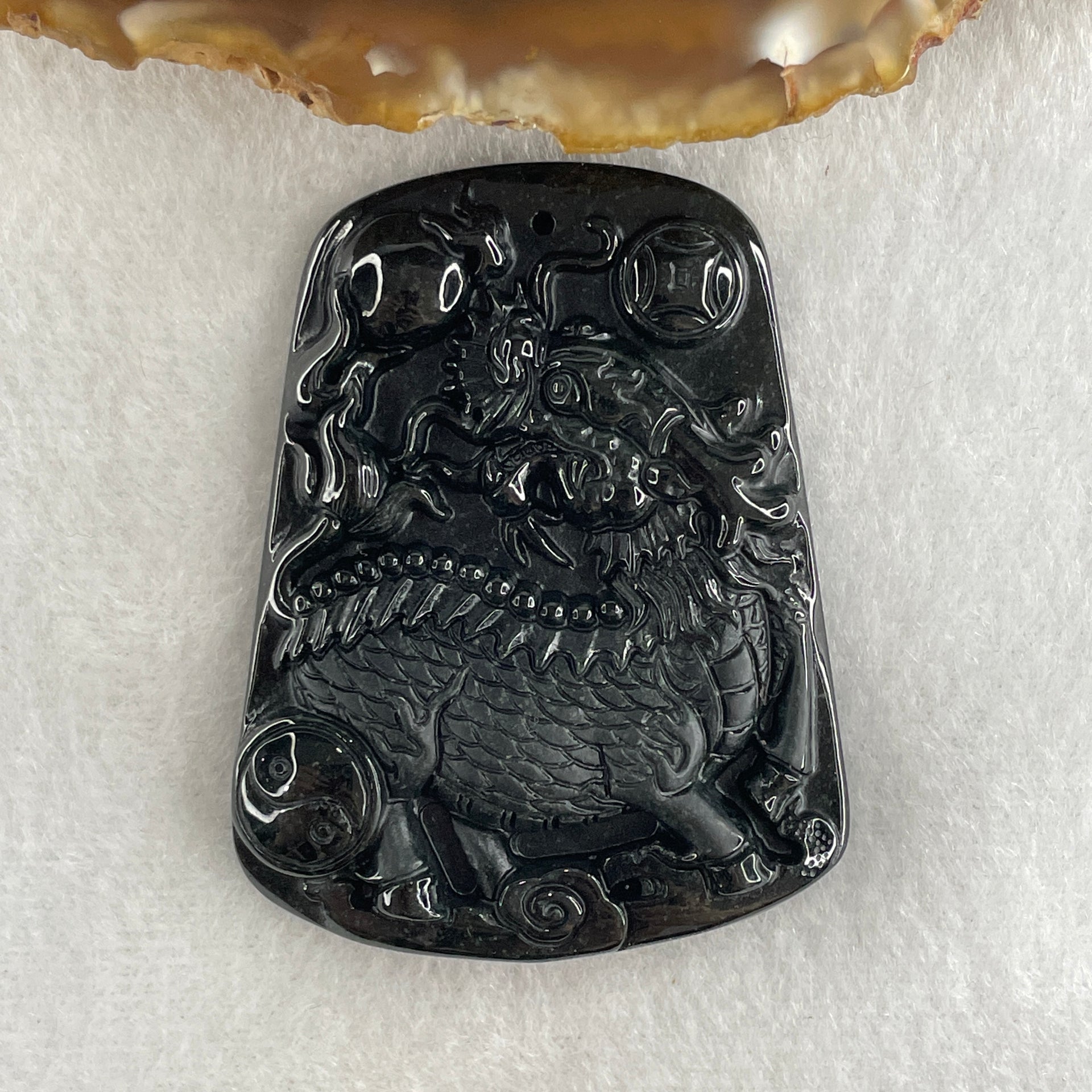 Type A Opaque to Partial Translucent Black Omphacite Jadeite Kirin Qilin Pendant 30.64g 55.7 by 43.5 by 8.5mm - Huangs Jadeite and Jewelry Pte Ltd