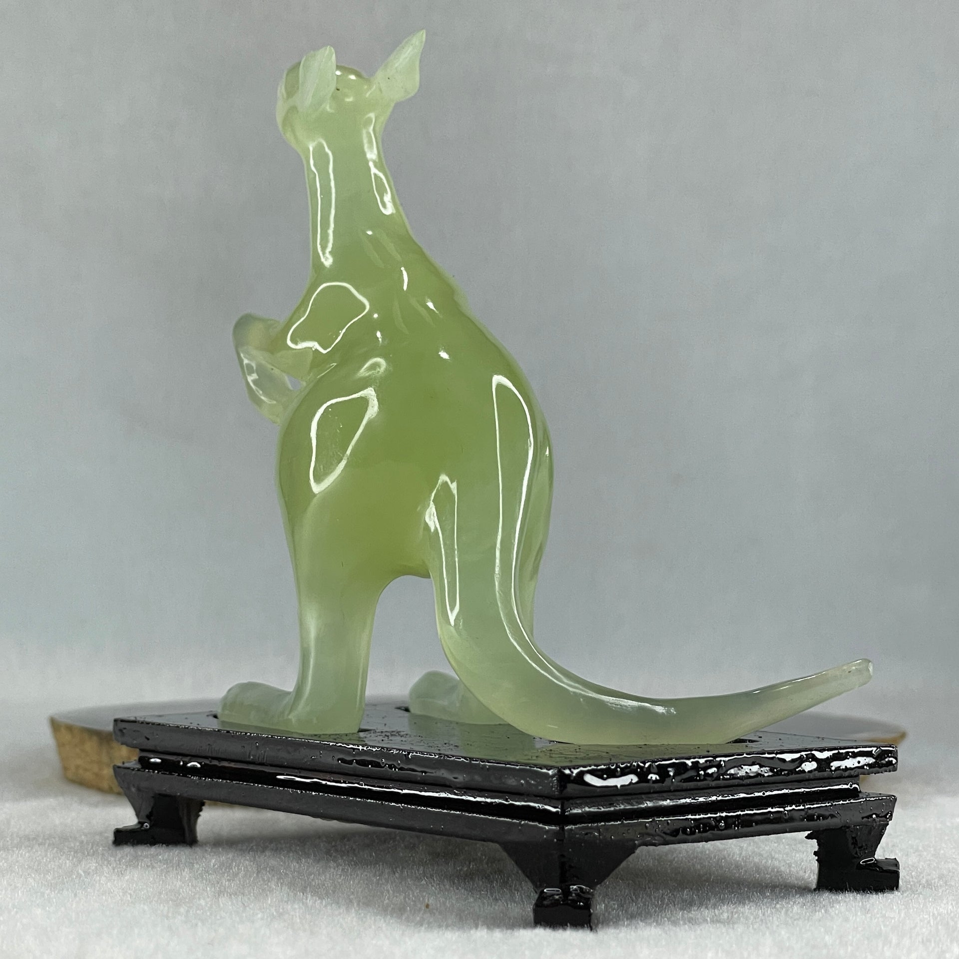 Natural Green Serpentine Kangaroo with Wooden Stand Display 172.6g 100.8 by 63.0 by 115.0mm - Huangs Jadeite and Jewelry Pte Ltd