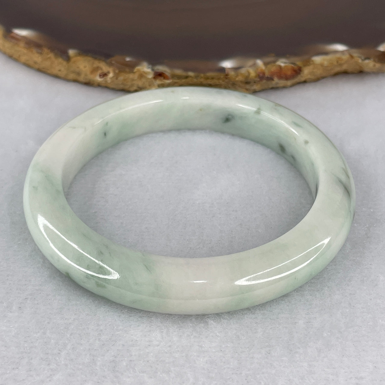 Certified Natural Type A Light Green with Green Piao Hua Jadeite Bangle 54.715g Internal Diameter 57.1mm 10.4 by 9.6mm (Very Very Slight Internal Lines)