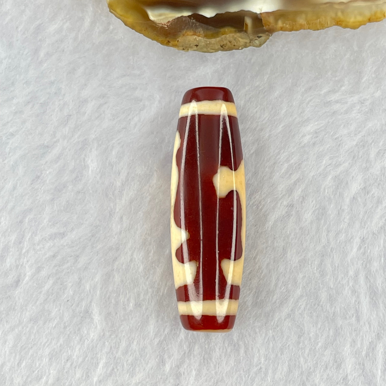 Natural Powerful Tibetan Old Oily Red and Yellowish White Agate Guan Yin Dzi Bead Heavenly Master (Tian Zhu) 观音天诛 8.00g 38.3 by 11.8mm - Huangs Jadeite and Jewelry Pte Ltd