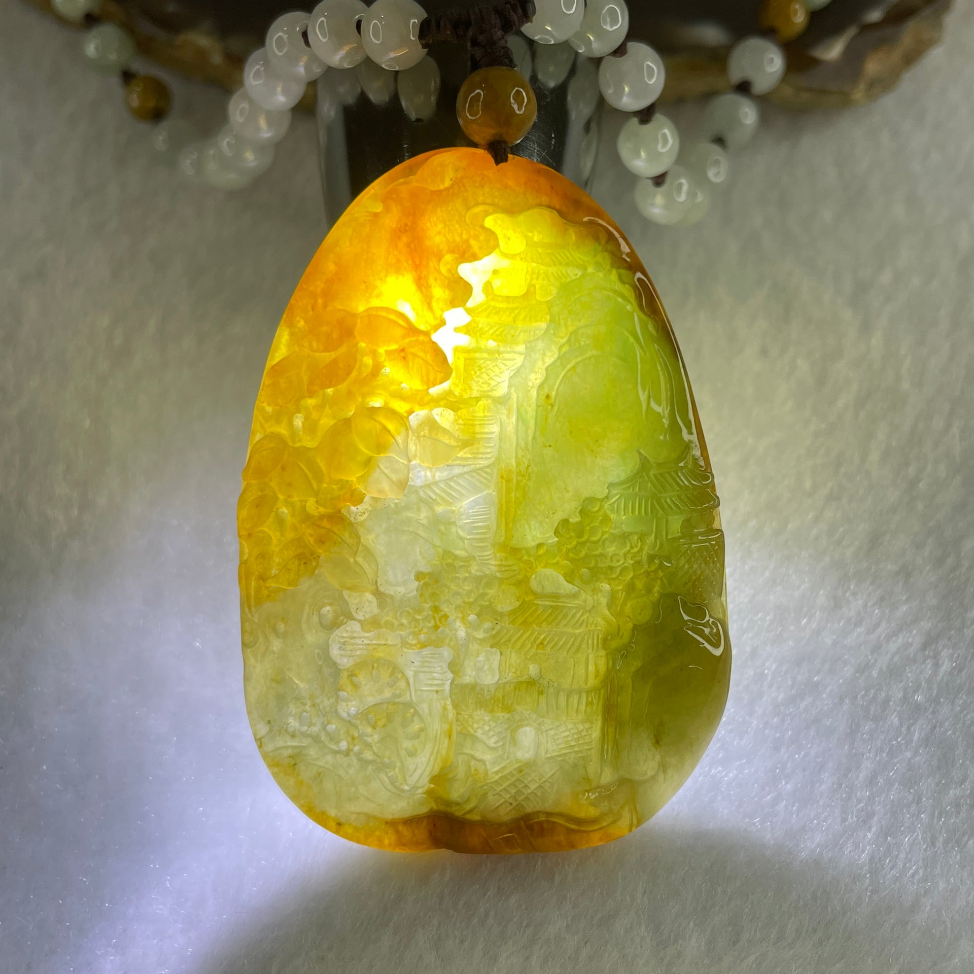 Grand Master Type A Green with Brownish Jadeite Shan Shui with Gui Ren Double Side Pendant 52.28g 55.3 by 38.2 by 7.3mm - Huangs Jadeite and Jewelry Pte Ltd