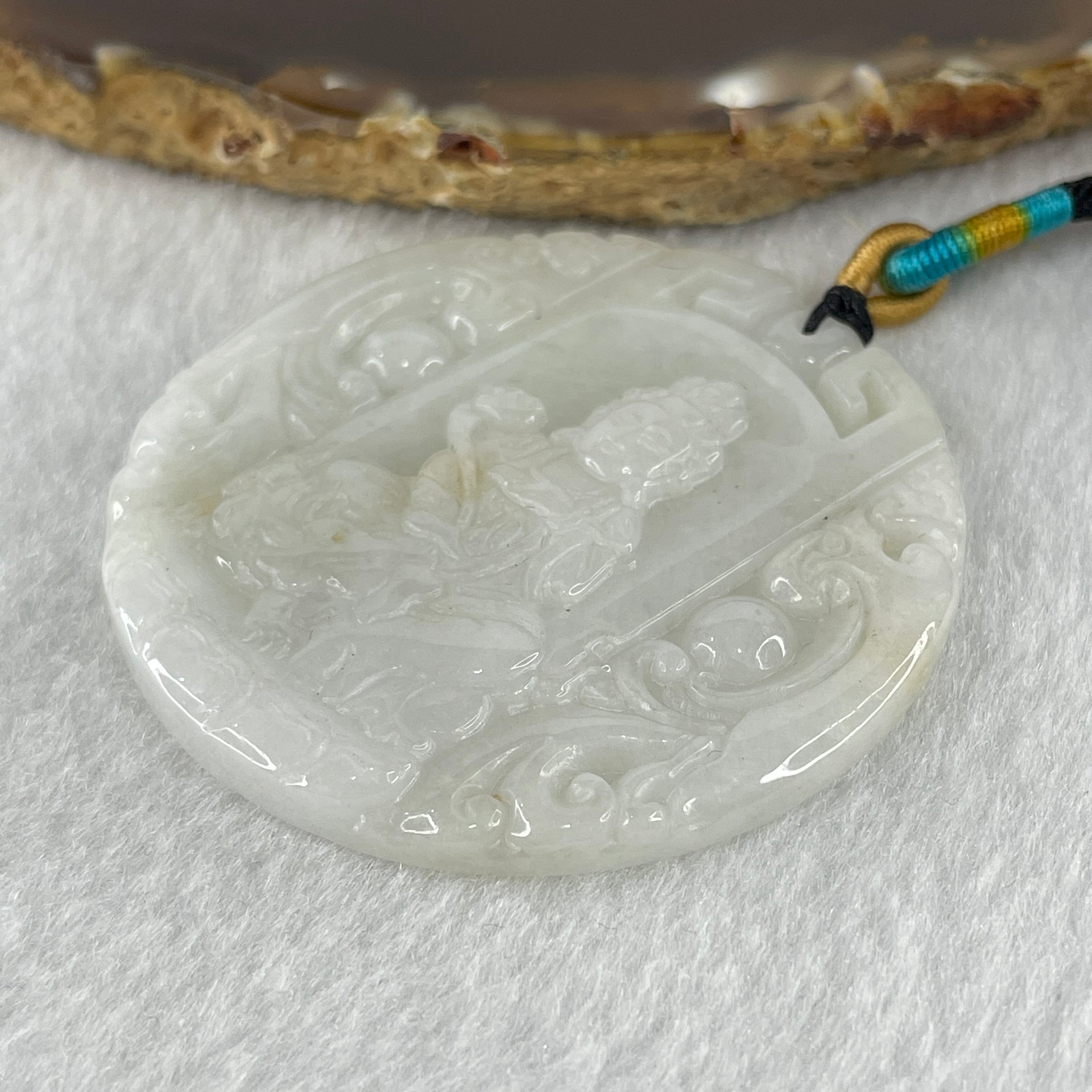 Natural Type A Faint Lavender Faint Green with Red Spots Jadeite Guan Yin Bodhisattva or Siṃhanāda Avalokiteśvara or Guanyin on Lion Roar Pendant 28.42g 51.0 by 5.6mm - Huangs Jadeite and Jewelry Pte Ltd