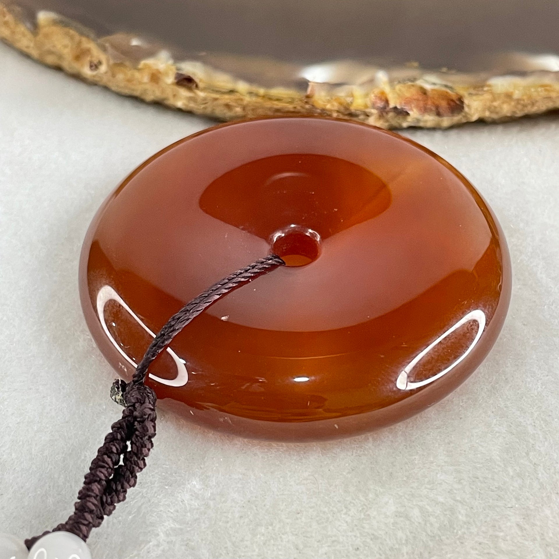 Natural Red Chalcedony Ping An Kou Donut 55.771g 52.6 by 11.2mm with White Crystal Beads Necklace 60cm - Huangs Jadeite and Jewelry Pte Ltd