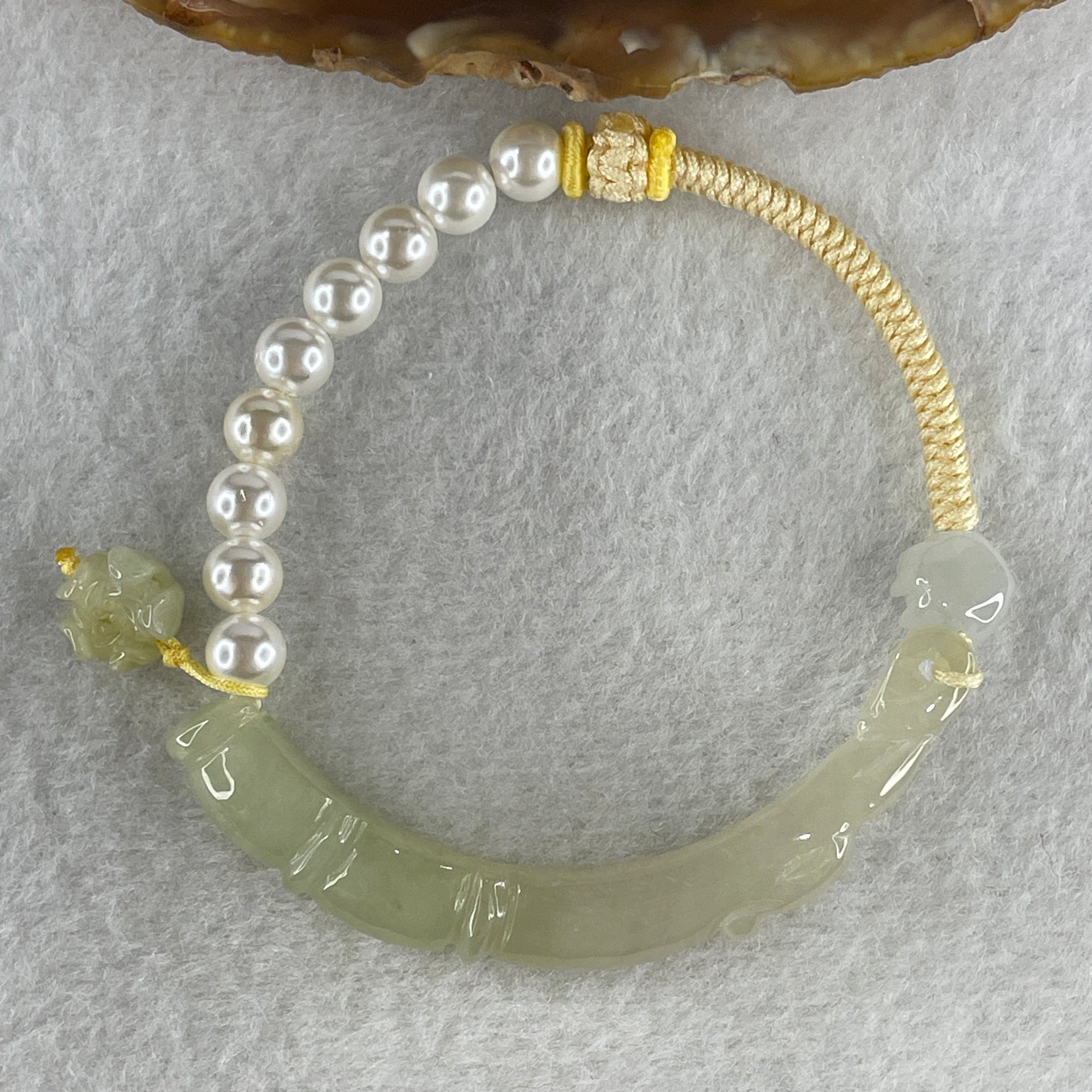 Natural Type A Semi Icy Light Green with Yellowish Jadeite Bamboo with Lotus Charm Bracelet 14.64g 15.5cm 6.18 by 7.5 by 8.2mm - Huangs Jadeite and Jewelry Pte Ltd