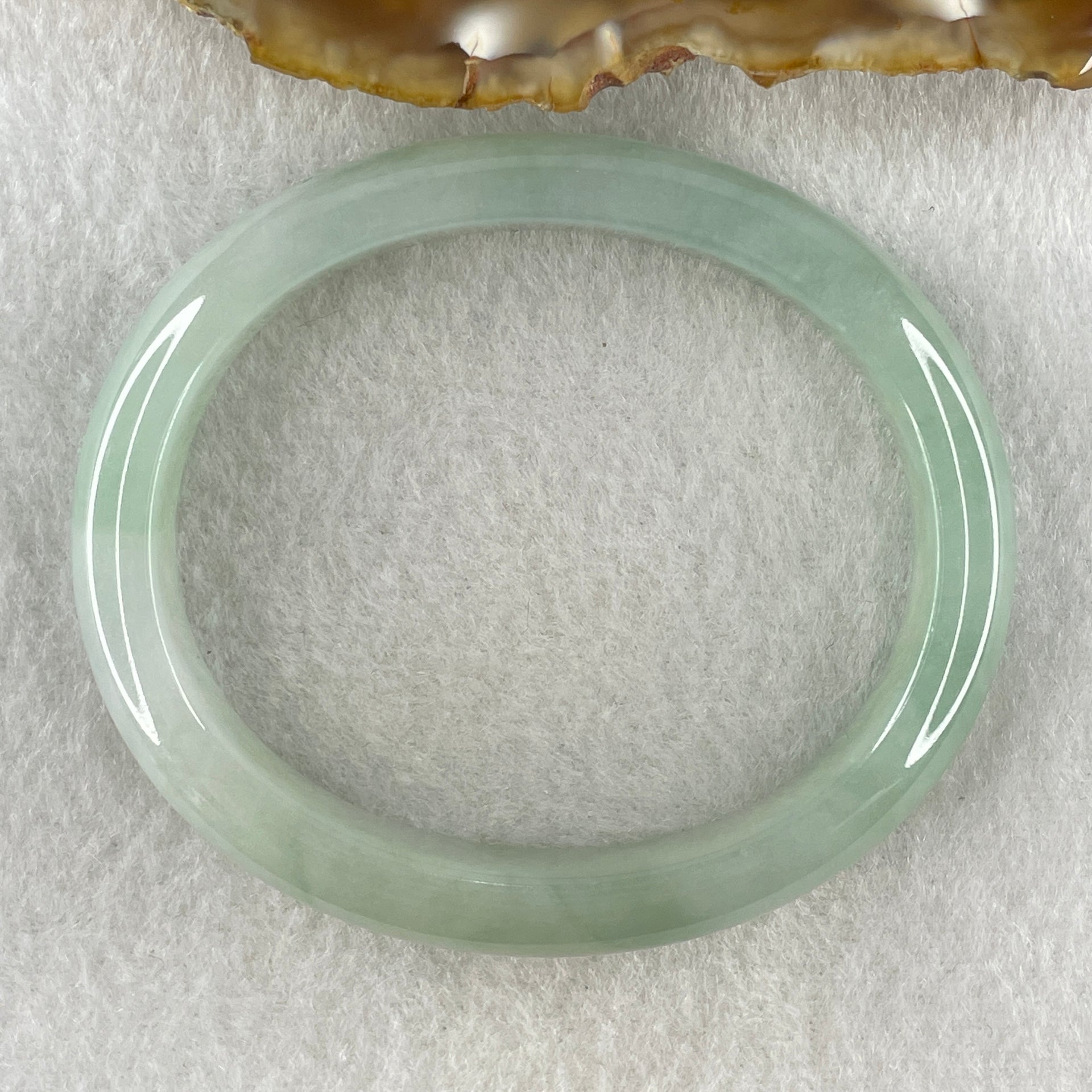 Natural Type A Jelly Full Light Green Jadeite Oval Bangle 34.07g Inner Diameter 53.8mm 10.2 by 7.4mm (Very Slight Internal Lines) - Huangs Jadeite and Jewelry Pte Ltd