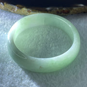 Natural Type A Light Green Jadeite Oval Bangle 36.17g Inner Diameter 54.6mm 12.5 by 6.4mm (Internal Lines) - Huangs Jadeite and Jewelry Pte Ltd