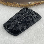 Type A Opaque to Partial Translucent Black Omphacite Jadeite Guan Yin on Dragon Pendant 29.57g 65.5 by 41.0 by 8.5mm - Huangs Jadeite and Jewelry Pte Ltd
