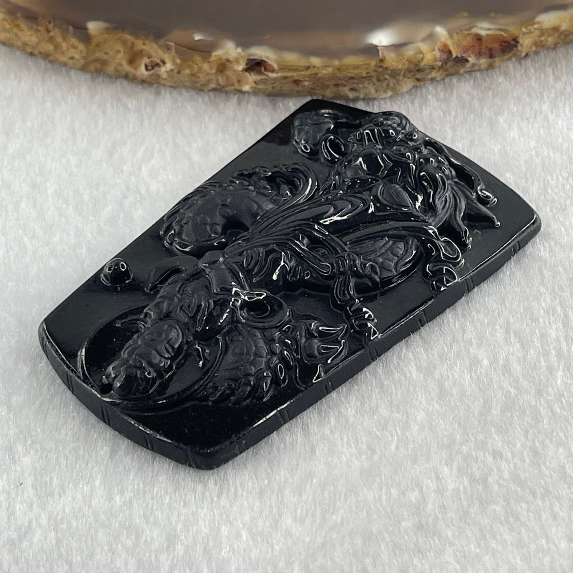 Type A Opaque to Partial Translucent Black Omphacite Jadeite Guan Yin on Dragon Pendant 29.57g 65.5 by 41.0 by 8.5mm - Huangs Jadeite and Jewelry Pte Ltd