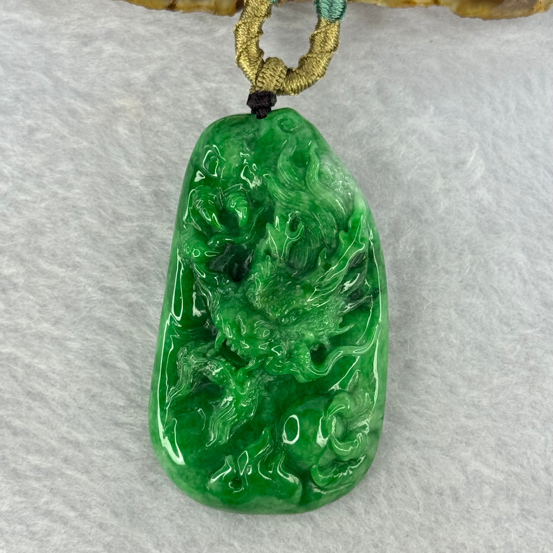 Grand Master Type A Spicy Green Jadeite Dragon 38.59g 54.6 by 31.6 by 11.3mm - Huangs Jadeite and Jewelry Pte Ltd