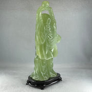 Natural Green Serpentine Stand Laughing Milo Buddha with Wealth Pot with Wooden Stand Display 1,599.3g 140.0 by 90.0 by 270.0mm - Huangs Jadeite and Jewelry Pte Ltd