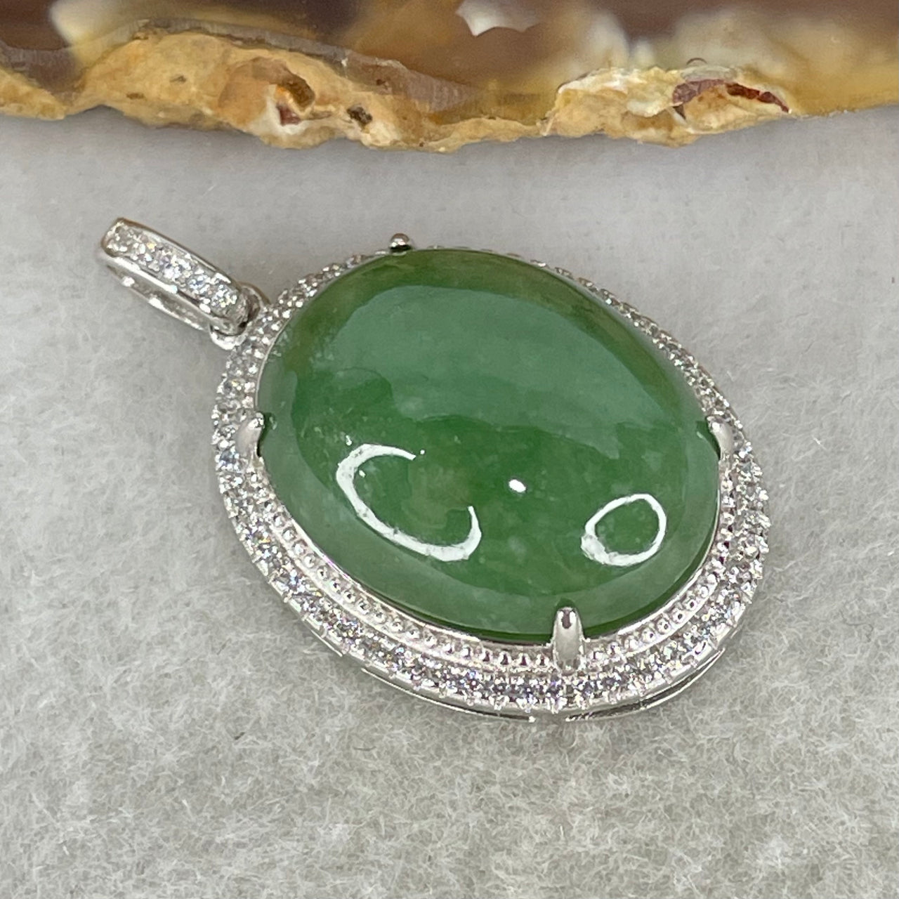Type A Old Mine Spicy Green Cabochon Jadeite in S925 Sliver with Crystal Charm 6.60g 19.2 by 15.1 by 6.5mm - Huangs Jadeite and Jewelry Pte Ltd