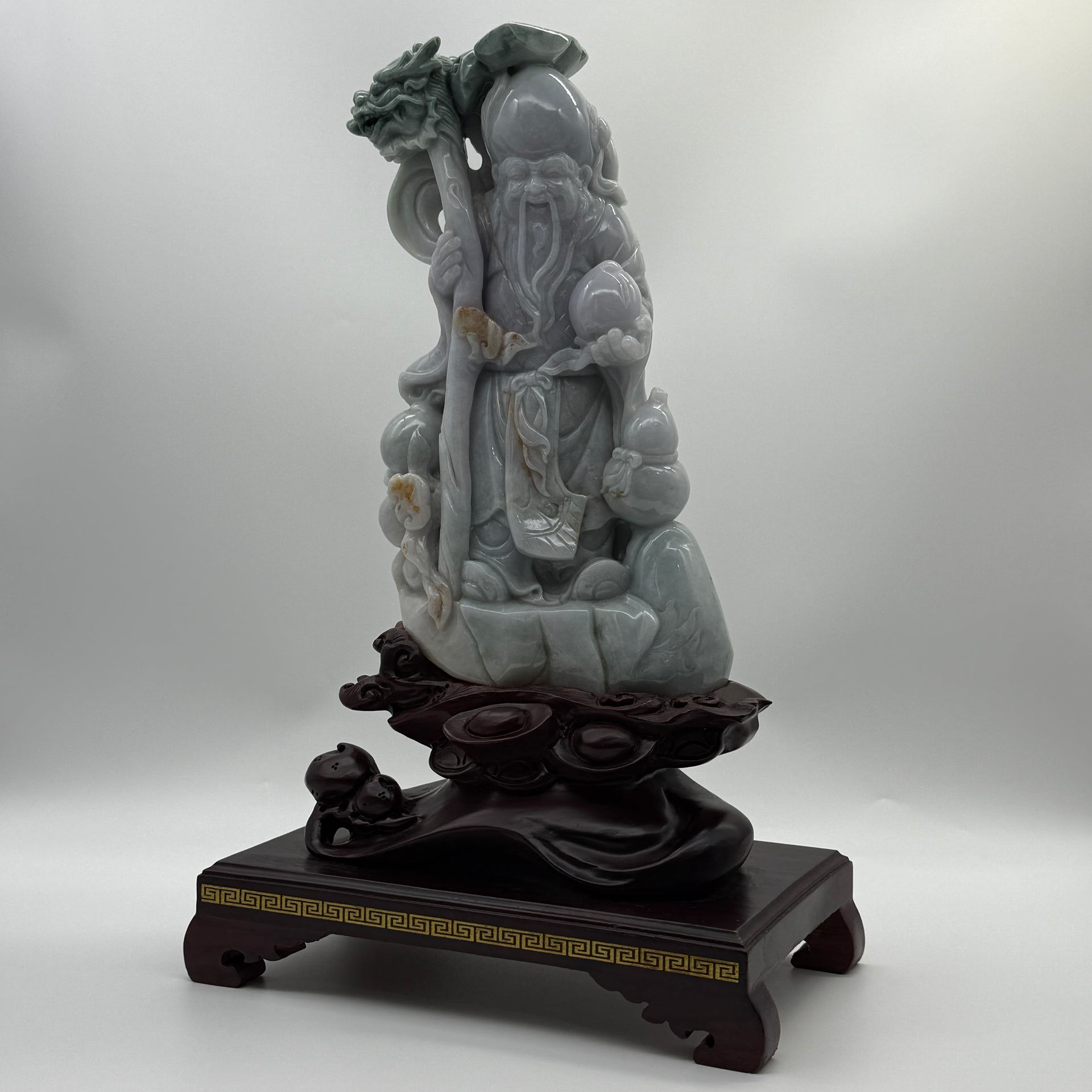 Type A Lavender, Green & Yellow Jade Jadeite Shou Xing Gong with Wooden Stand 财源滚滚 健康长寿 - 3.93kg Dimensions with Stand: 39 by 25 by 15cm Jade Dimensions: 27 by 15 by 7cm - Huangs Jadeite and Jewelry Pte Ltd