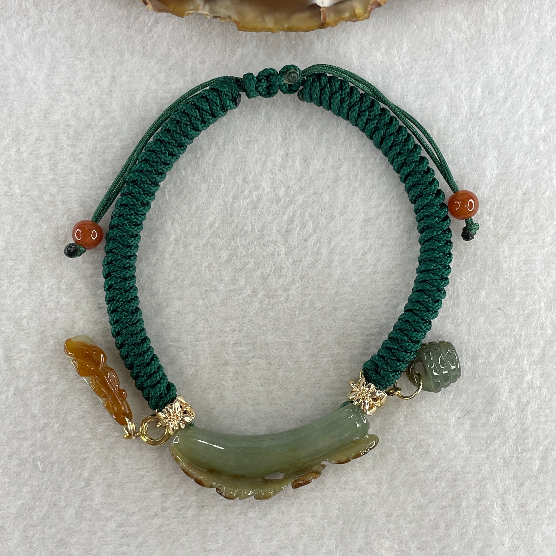 Natural Type A Brownish with Green Jadeite Flowers with Gold Fish and Bag Charms Bracelet 12.29g 17cm 7.0 by 10.9mm - Huangs Jadeite and Jewelry Pte Ltd