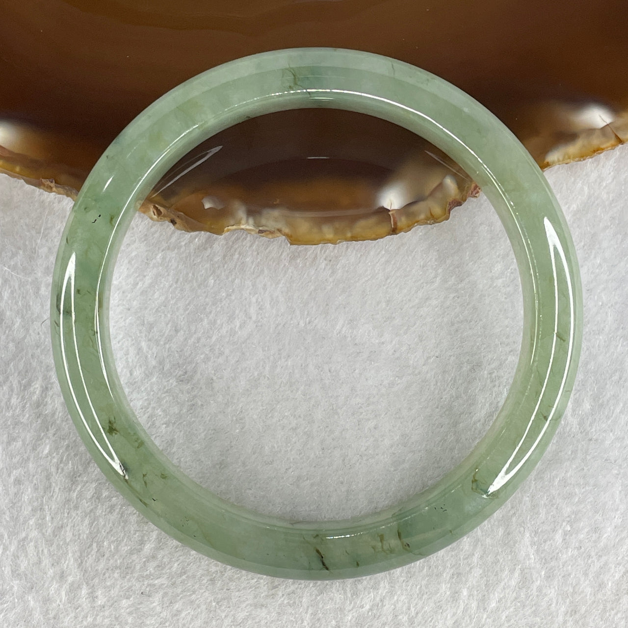 Certified Natural Type A Jelly Green with Brownish Spot Jadeite Bangle 45.20g Internal Diameter 58.6mm 10.0 by 8.1mm (Very Very Slight Internal Line)