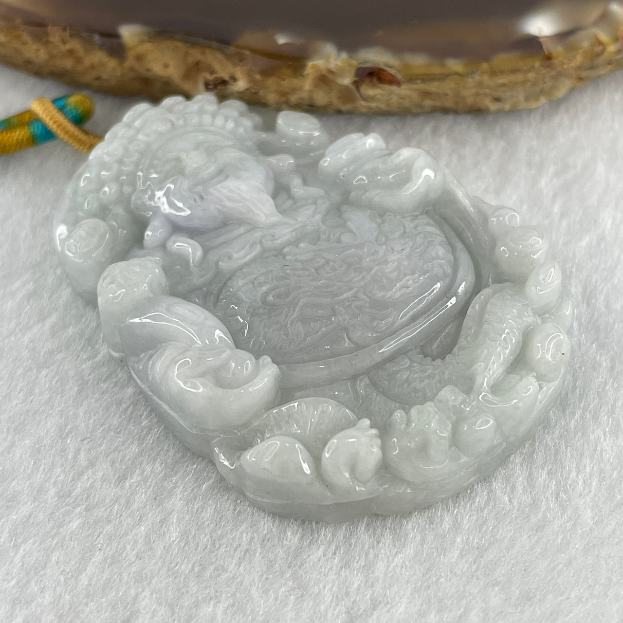 Natural Type A Light Lavender with Light Green Jadeite Cai Shen Ye God of Fortune Pendant 43.34g 52.9 by 37.5 by 11.5mm