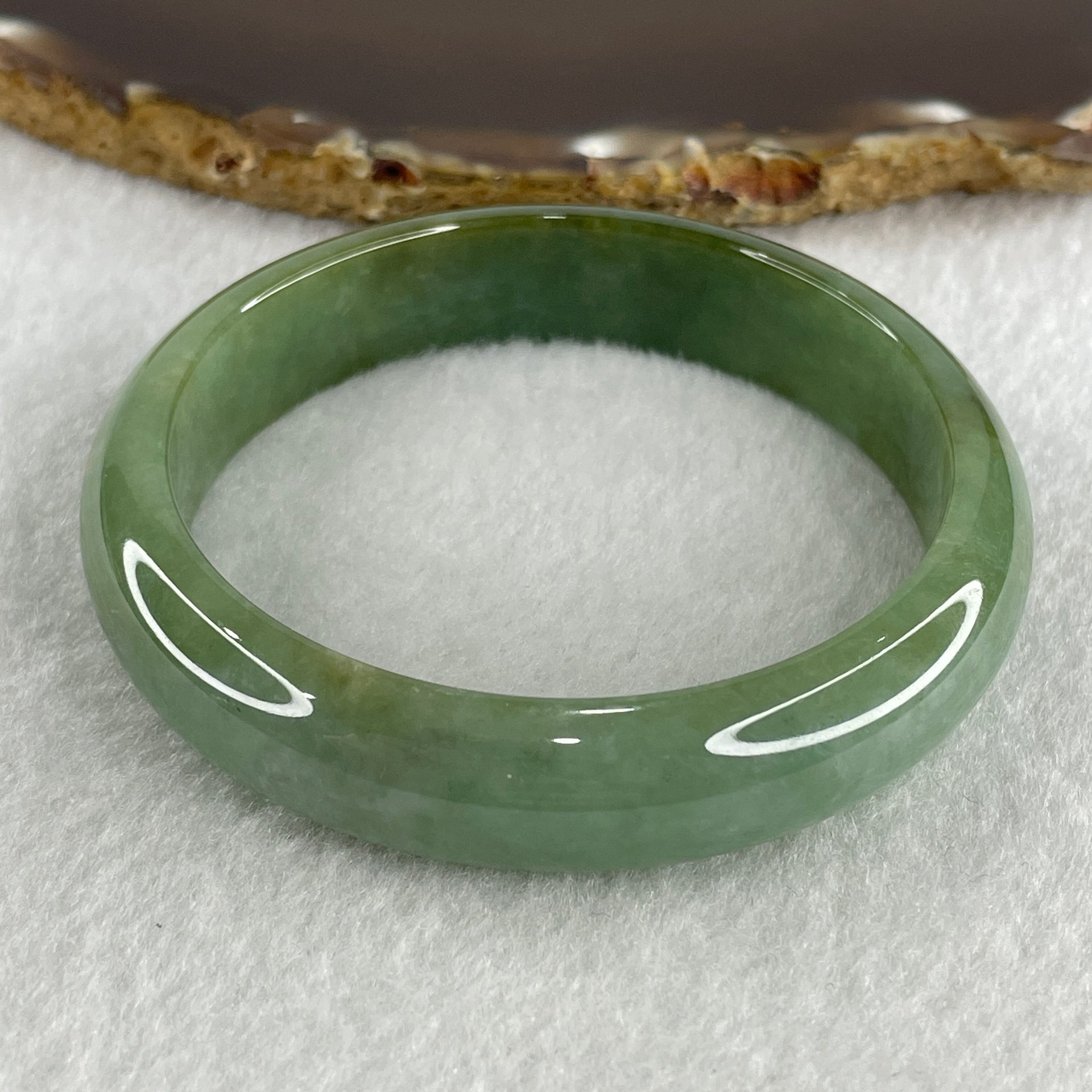 Type A Natural Jelly Green with Brownish Piao Hua Jadeite Bangle 49.14g Inner Diameter 57.2mm 13.1 by 7.3mm (Close to Perfect) - Huangs Jadeite and Jewelry Pte Ltd