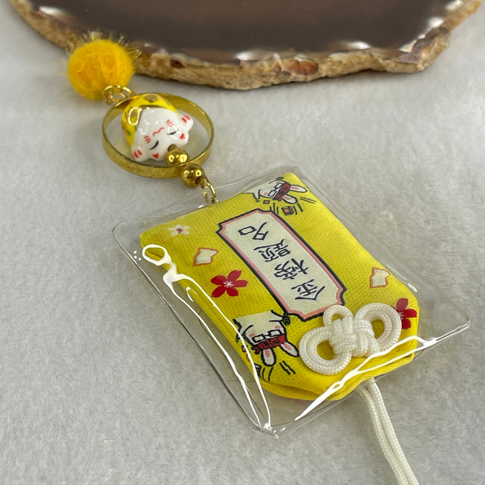 Porcelain Yellow Fortune Cat Yushou Charm 14.09g 14.8 by 17.5 by 14.4mm - Huangs Jadeite and Jewelry Pte Ltd