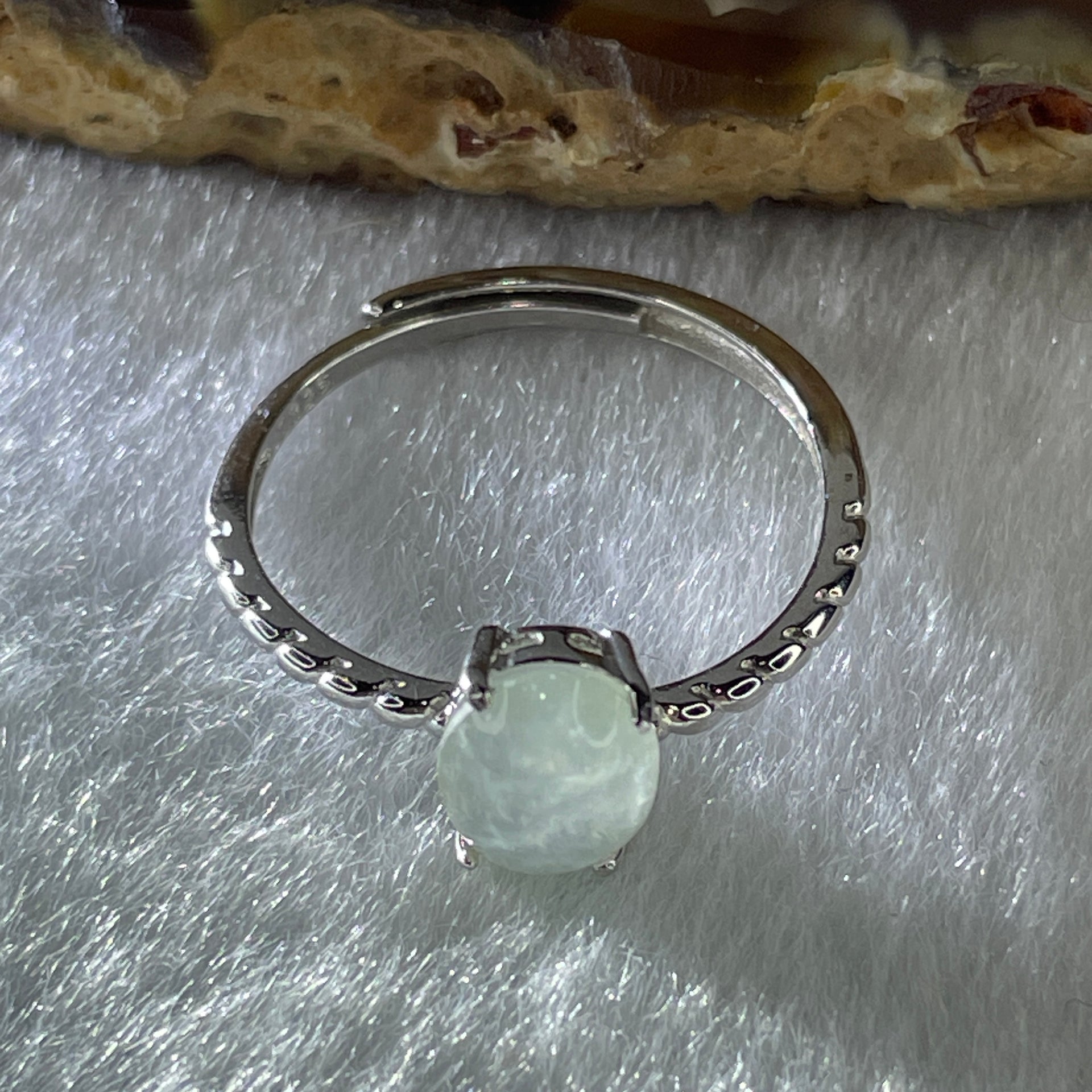 Natural Type A Semi Icy Faint Green Jadeite Oval Shape Cabouchon in S925 Silver Ring (Adjustable Size) 1.50g 7.9 by 6.3 by 3.5mm - Huangs Jadeite and Jewelry Pte Ltd
