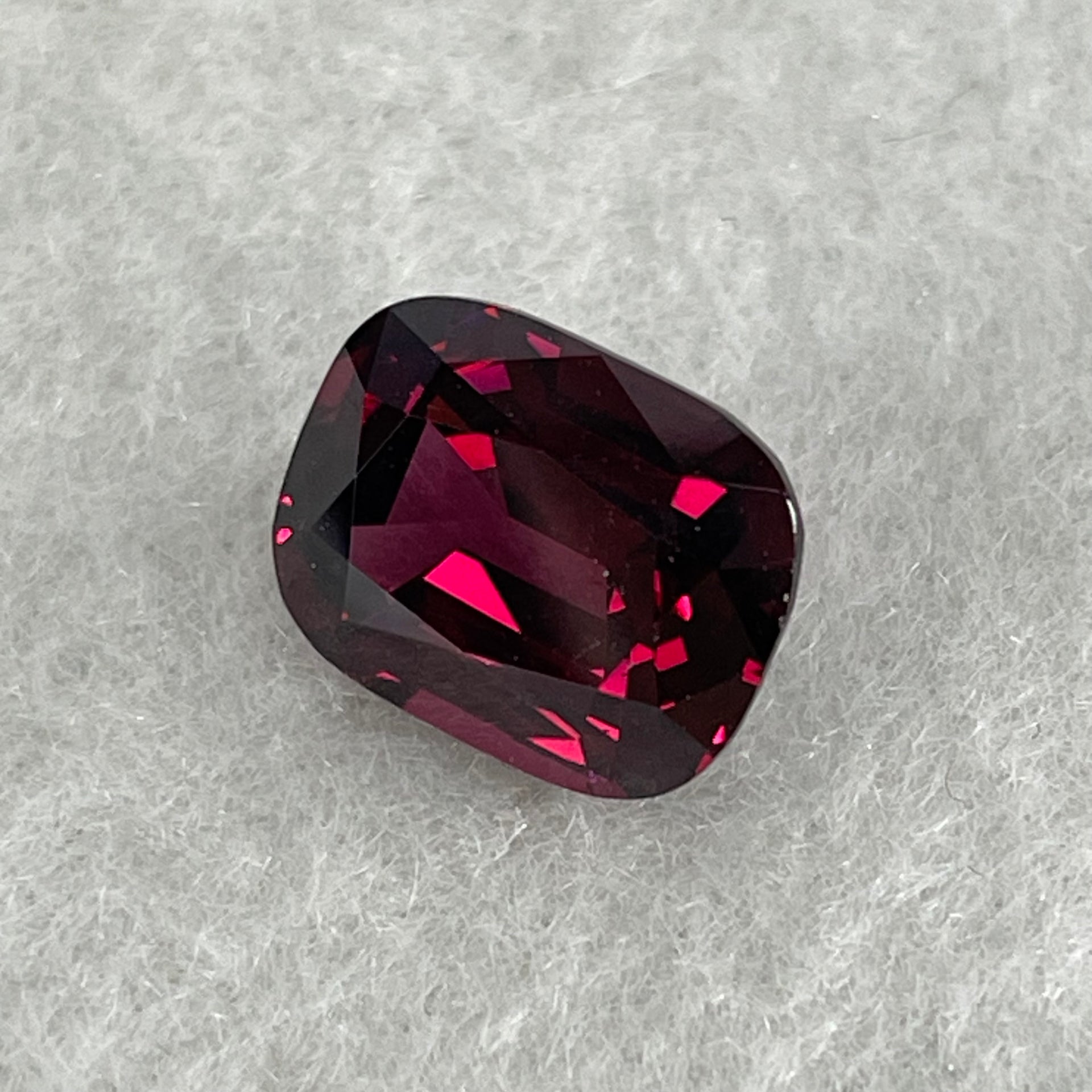 Natural Red Rhodolite Garnet Stone for Setting Cushion, brilliant/step cut 4.38cts 10.69 by 8.25 by 3.53mm NGI Cert No:32887346 - Huangs Jadeite and Jewelry Pte Ltd