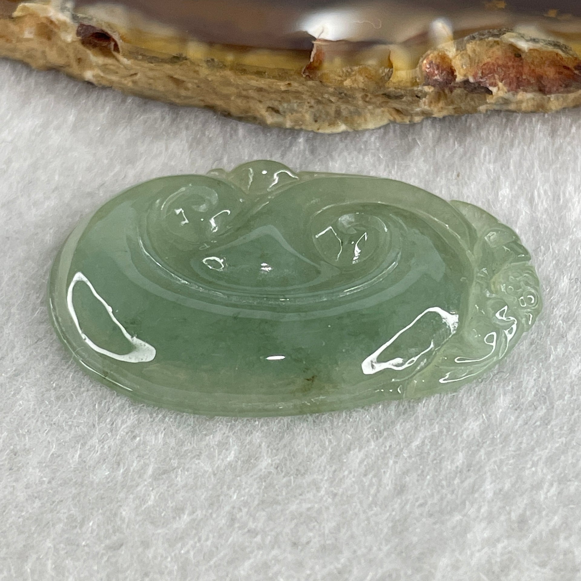 Natural Type A Semi Icy Green Jadeite Monkey on Ruyi Pendant 6.96g 37.6 by 25.5 by 4.4mm - Huangs Jadeite and Jewelry Pte Ltd
