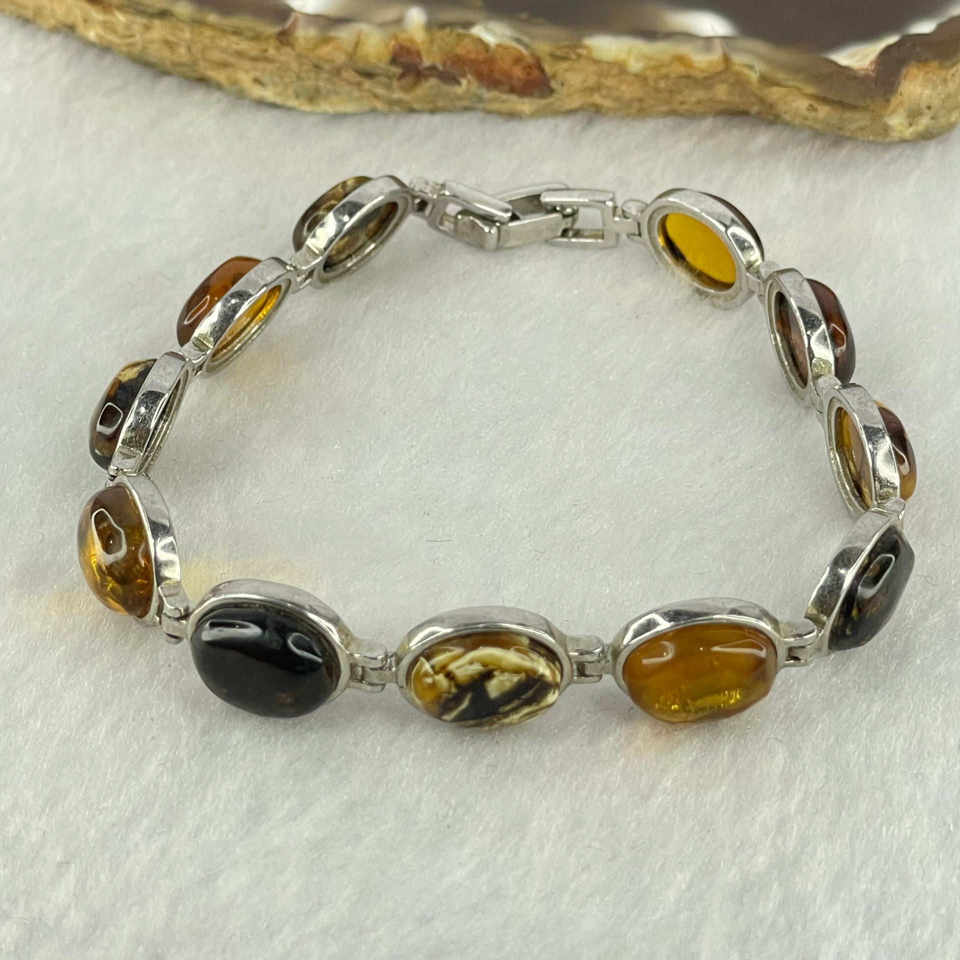 Natural Mixed Color Amber Beads in Sliver Bracelet 天然抚顺多宝手链 11.11g 16.5cm 10.0 by 7.9 by 4.0mm 11pcs - Huangs Jadeite and Jewelry Pte Ltd