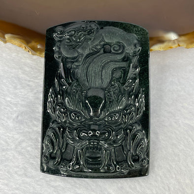 Type A Partial Translucent Black Omphasite Dragon and Baby Dragon Pendent A货墨翠笼饺子牌 42.72g 67.0 by 45.7 by 9.0 mm - Huangs Jadeite and Jewelry Pte Ltd