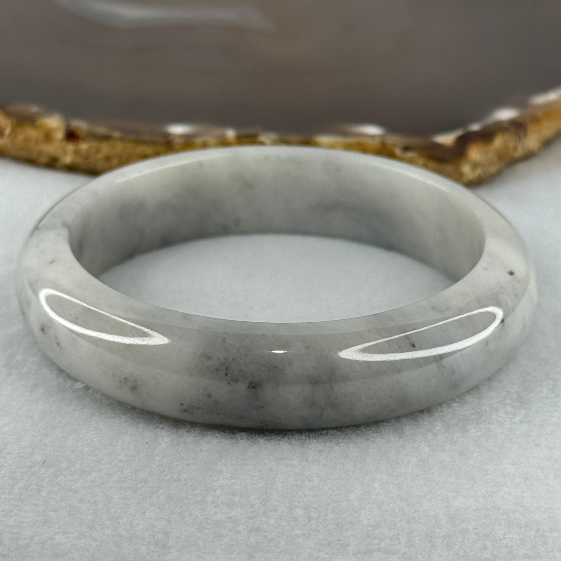 Type A Faint Green Grey Wuji Piao Hua Jadeite Bangle Internal Diameter 58.8mm 68.72g 14.6 by 8.8mm (Very Slight Internal Lines) - Huangs Jadeite and Jewelry Pte Ltd