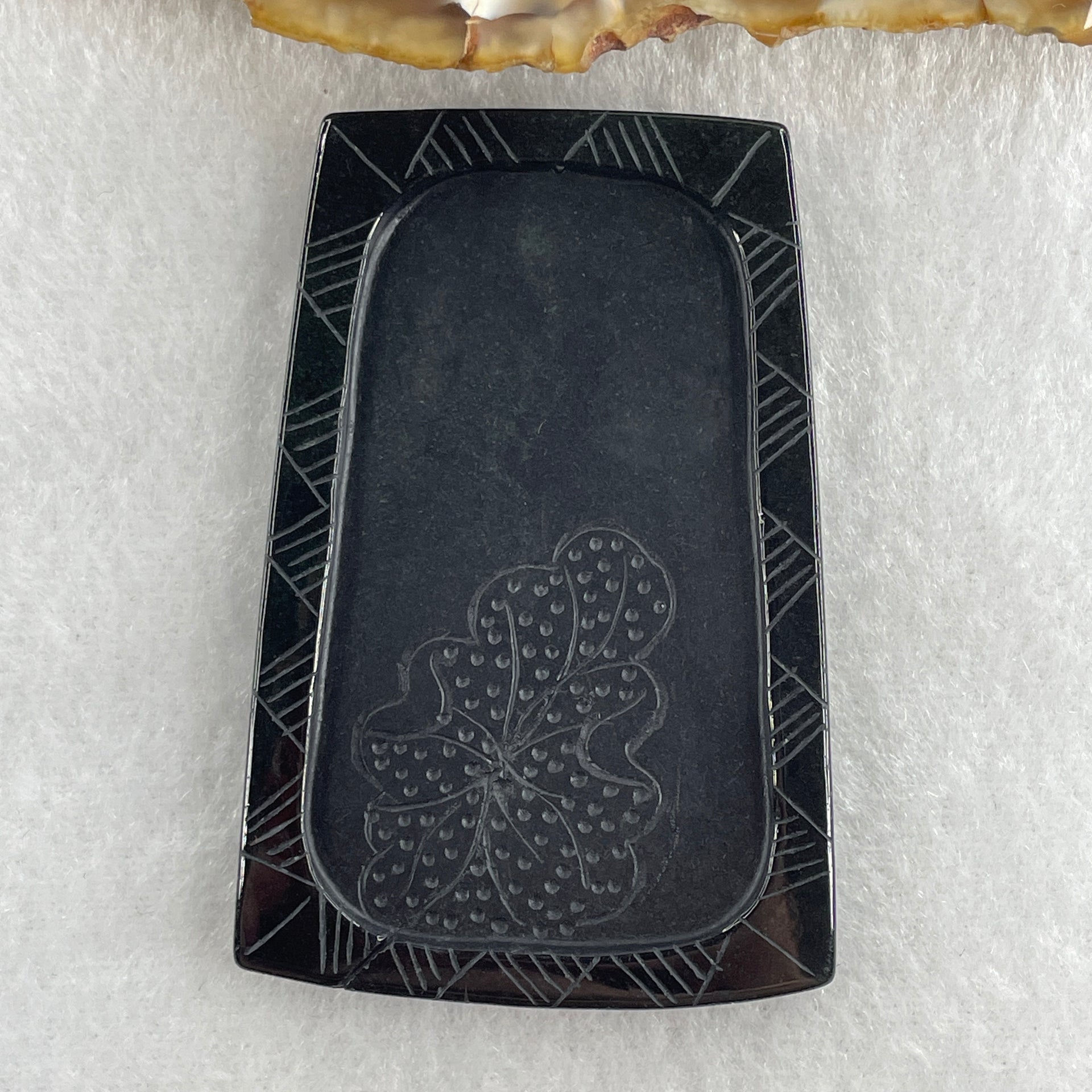 Type A Opaque to Partial Translucent Black Omphacite Jadeite Dragon Pendant 30.25g 64.4 by 42.8 by 8.2mm - Huangs Jadeite and Jewelry Pte Ltd