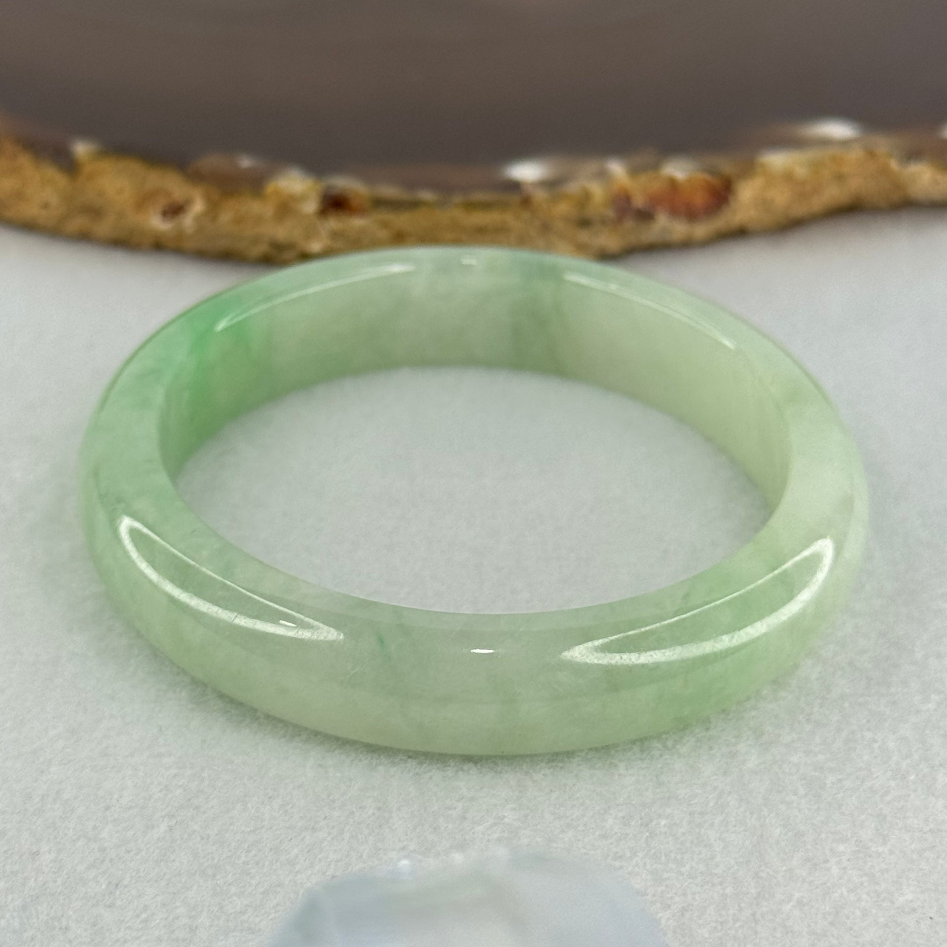 Type A Semi Icy Bright Green Jadeite Oval Bangle Internal Diameter 54.4mm 40.37g 11.3 by 8.4mm (Slight Internal Lines) - Huangs Jadeite and Jewelry Pte Ltd