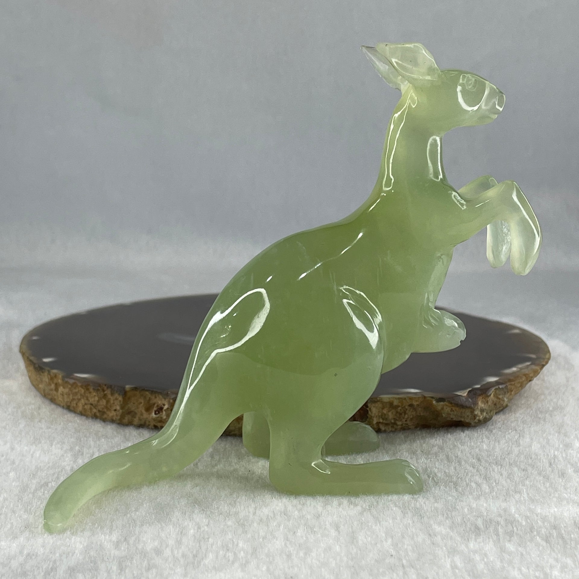 Natural Green Serpentine Kangaroo with Baby with Wooden Stand Display 235.6g 125.0 by 63.8 by 116.5mm - Huangs Jadeite and Jewelry Pte Ltd
