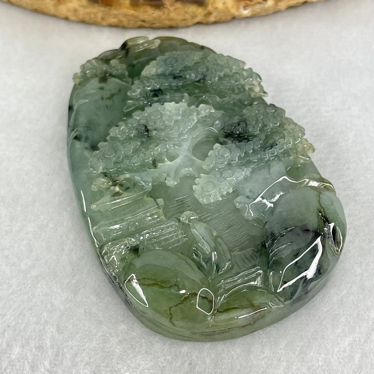 Type A Semi Icy Green with Dark Green Piao Hua Jadeite Shan Shui Gui Ren Benefactor Pendant 53.05g 59.6 by 40.3 by 10.7mm - Huangs Jadeite and Jewelry Pte Ltd